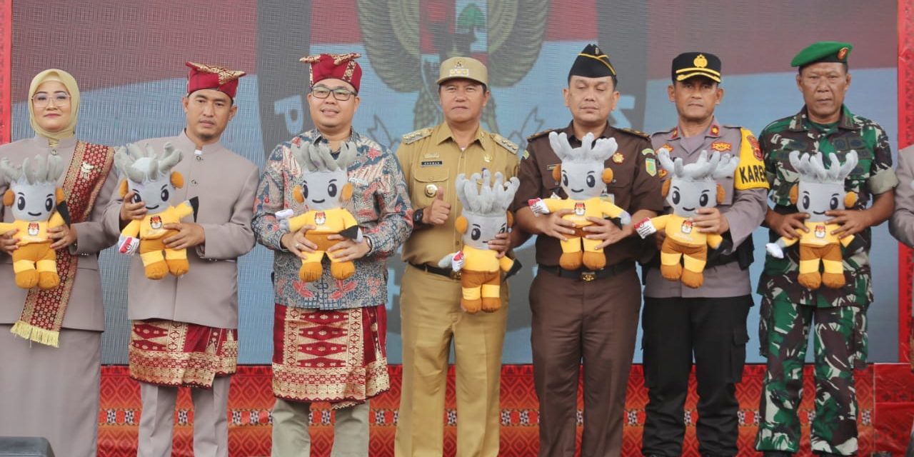 Pj Bupati Nukman Resmi Meluncurkan Maskot Pemilihan Bupati dan Wakil Bupati Lampung Barat.